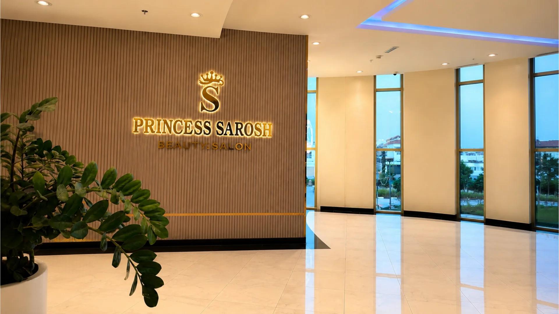 The Princess Sarosh entrance with the gold crown logo